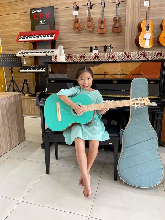 đàn guitar acoustic bảo lộc