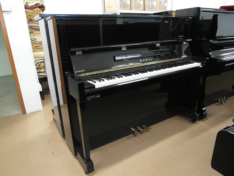 mua piano cu kawai ku10