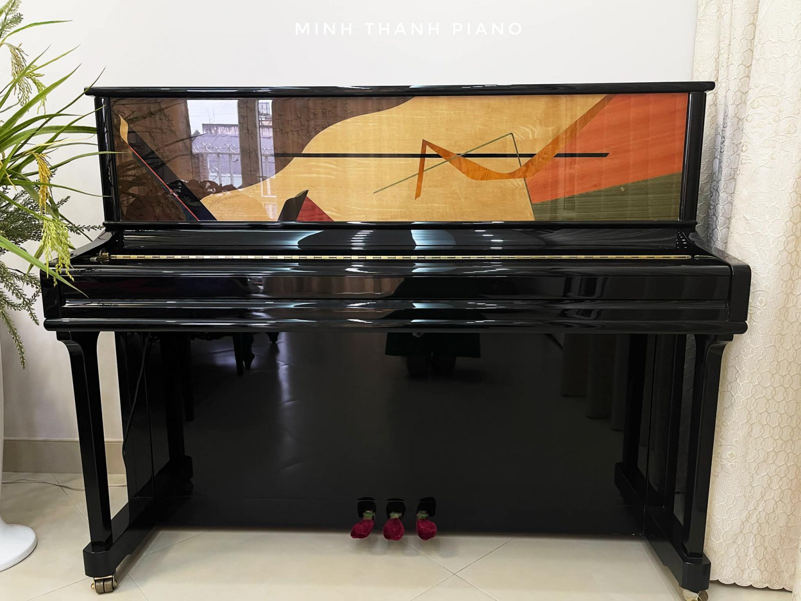 đàn piano Samick J303E